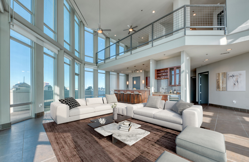 Large open living area with plenty of large windows for natural light